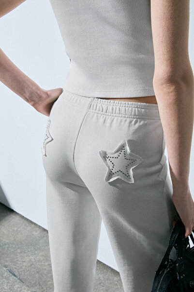 GRIMELANGE Loventa women's wide leg regular fit white sweatpants with stone e...