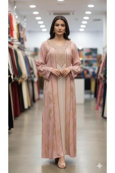 Generic A jalabiya in a soft pink color, featuring a delicate design and gold...