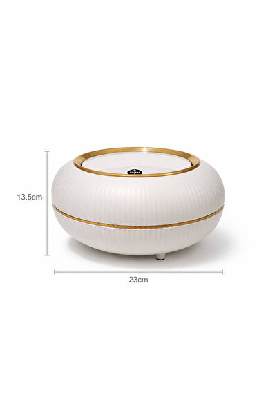 China A luxurious oval wastebasket with an elegant gold touch.
