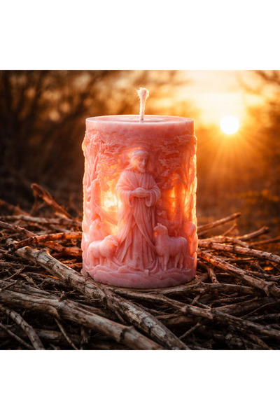 victiny Candle with the Image of Christ in the shape of an egg for Easter or ...