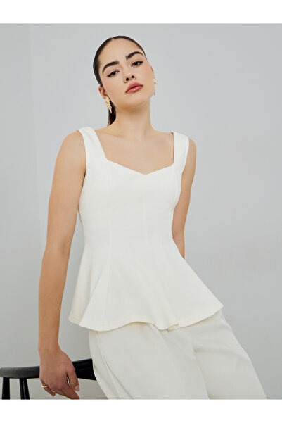 Styli White Sleeveless Peplum Top