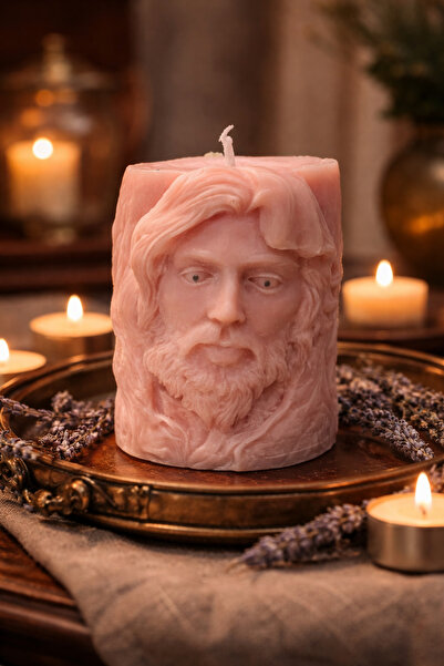 victiny Candle with the Image of Christ in the shape of an egg for Easter or ...