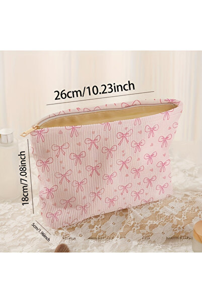 Choice حقيبة مستحضرات تجميل وردية اللون مزينة بفيونكة، مصنوعة من قماش الكوردر...