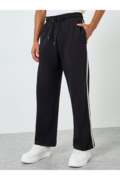 Styli Black Oversized Zig Zag Side Tape Joggers