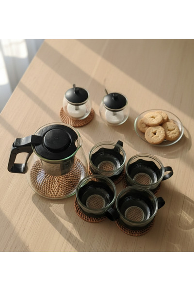 le tribute A modern tea and coffee set that comes with 4 glass cups adorned w...