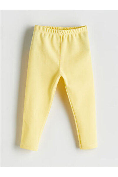 LC Waikiki بنطلون ضيق للفتيات الصغيرات من القطن الممشط مع خصر مطاطي باللون ال...