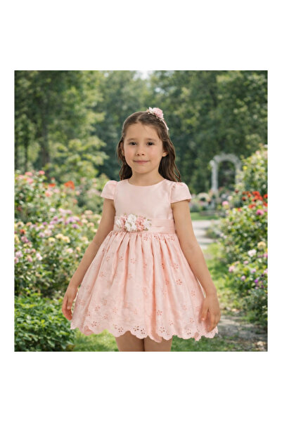 Pamina Apricot dress for special occasions with a hair tie