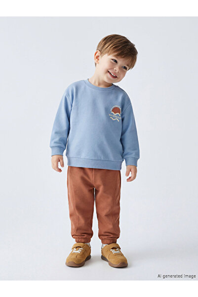 LC Waikiki مجموعة إلسيفا سويت شيرت وبنطلون رياضي للأولاد الصغار مطبوع باللون ...