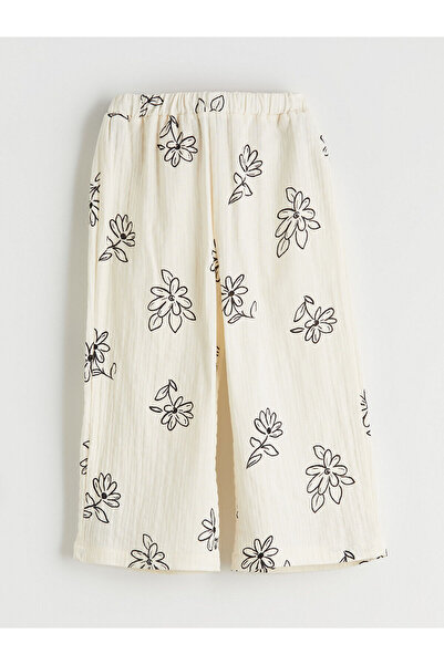 LC Waikiki مجموعة إلسيفا - بنطلون بناتي مزين بالزهور مع خصر مطاطي بلون إكرو