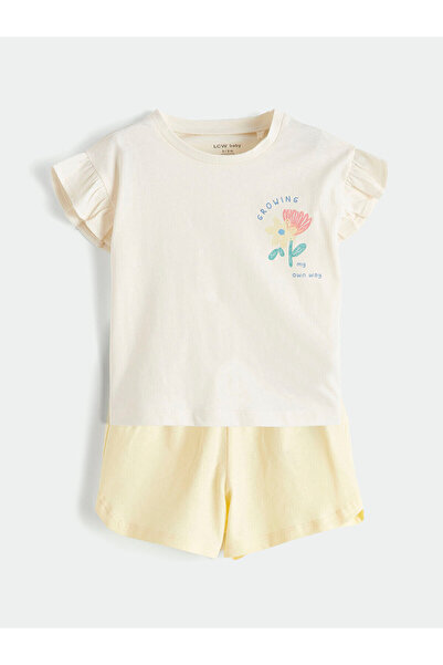 LC Waikiki مجموعة إلسيفا تي شيرت وشورت بناتي مزين بالكشكشة وطباعة زهور إكرو