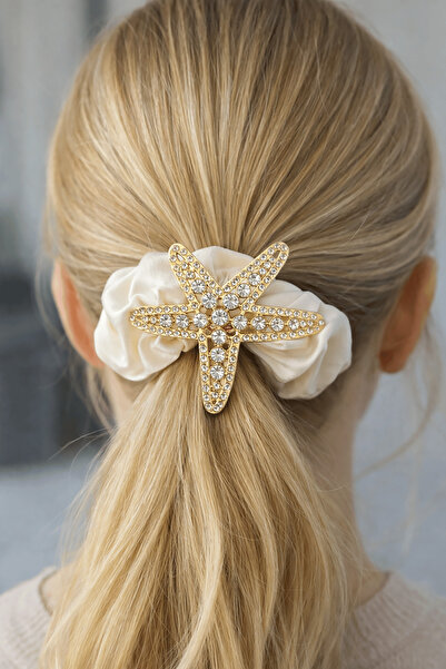 TAKIŞTIR Λαστιχένια πόρπη σε χρυσό χρώμα με φιγούρα αστεριού και λεπτομέρεια ...