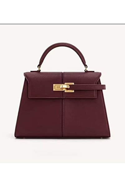 GENERAL Luxury leather handbag in a burgundy color – with an elegant lock