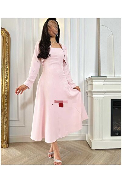 FASHION A set in a calm pink color consisting of a midi dress and a short jac...