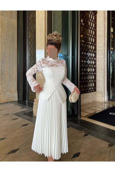 FASHION طقم مناسبات باللون الأبيض الناصع، يجمع بين الدانتيل الراقي والتنورة ا...