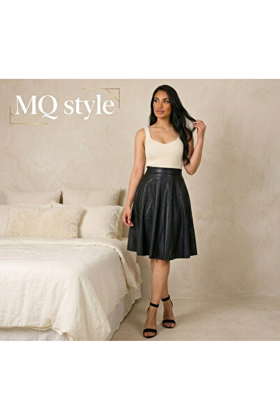 MQ A black pleated skirt from Style – the epitome of femininity