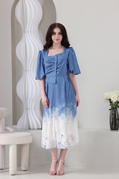 Verona A blue midi dress with an artistic gradient and a soft print – an eleg...