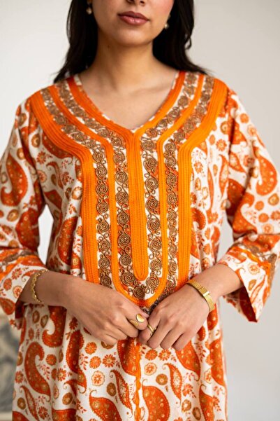 AFandina Linen jalabiya with a distinctive design and luxurious details, suit...