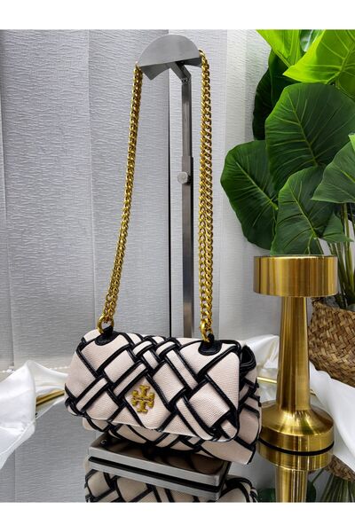 GENERAL A stylish women's Shoulder Bag with a distinctive mesh design that co...