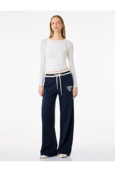 Koton Pantaloni de trening cu talie elastică, croială normală, cu imprimeu de...