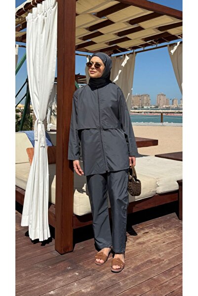 lurex moda بدلة سباحة تيسيتير كاملة التغطية من قماش الباراشوت من الدوحة، مكون...