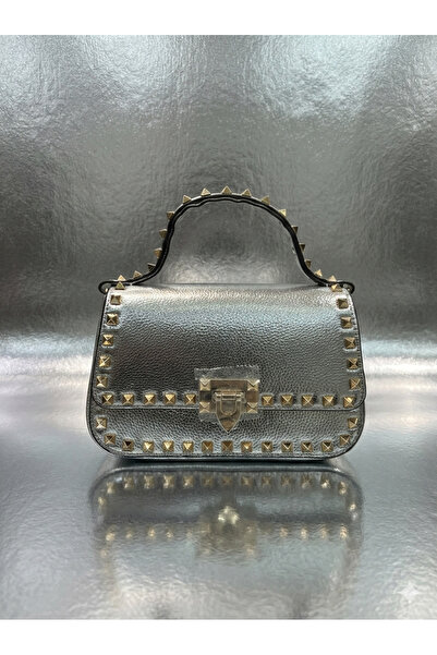 GC A charming and distinctive look with this silver bag studded with sparklin...
