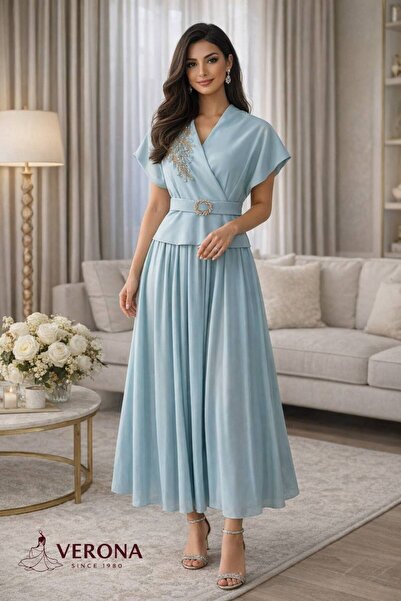 Verona A reception and evening dress with a modern wrap design and luxurious ...