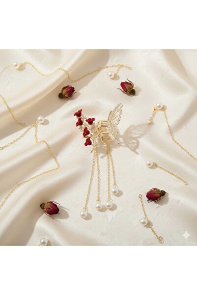 Daily Bazaar Η υπογραφή της κομψότητας: Μεταλλική αγκράφα με λεπτομέρεια πετα...