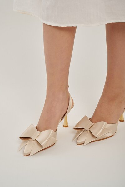 Modezya حذاء نسائي بكعب من إلينا شامبانيا مزين بفيونكة من الساتان وحزام خلفي