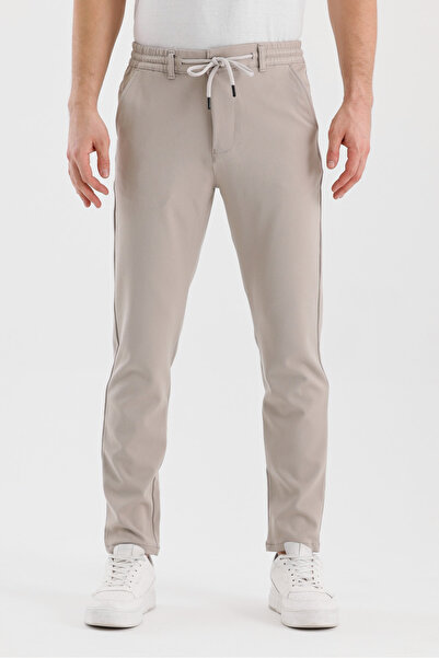 twentyfive25 بنطلون رجالي بلون الحجر موسمي من قماش الجاجر المحبوك بخصر مطاطي ...