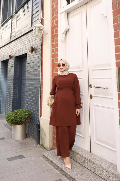 Kalemen Moda بدلة ايروبين الأنيقة 1987 بني