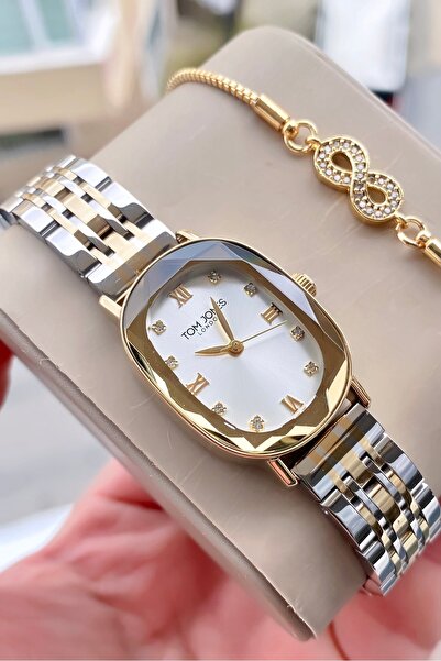 Tom Jones kadın kol saati orjinal 3atm su gecirmez çelik 2 yıl garantili bile...