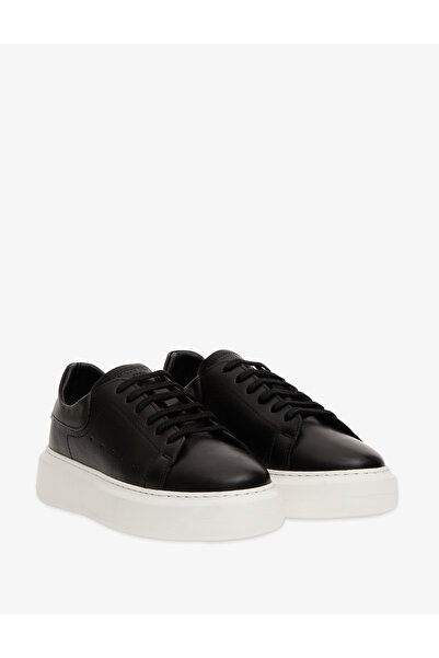 Pierre Cardin حذاء رياضي من الجلد باللون الأسود 50300072-VR046