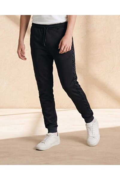 REDTAG Senior Boys Black Flock Detail Elasticated Hem Active Pants