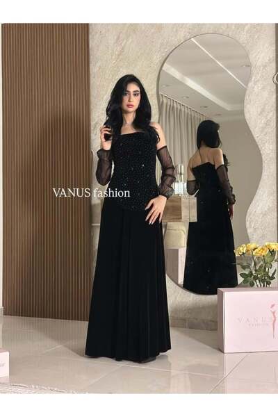vanus fashion 6874 - فستان أسود أنيق بتفاصيل لامعة ولمسة عصرية