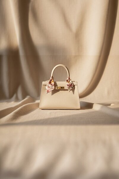 VELLABAGS حقيبة يد وكتف من جلد الغزال المزخرف بلون إكرو مع مقبض وشال ذهبي قاب...