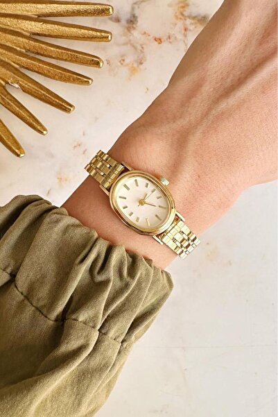 OQQO ساعة يد نسائية من نيرا جولد