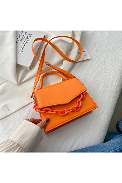 Mad Diva Small Orange Shoulder Bag Made of Eco- Leather , Accessorized with C...