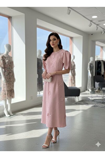 Pyramid masterpieces A girl's dress in a soft pink color