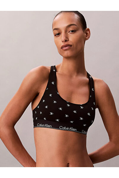 Calvin Klein حمالة صدر نسائية ذات ياقة مربعة ومرنة وضيقة ومرقعة بنمط حروف كال...