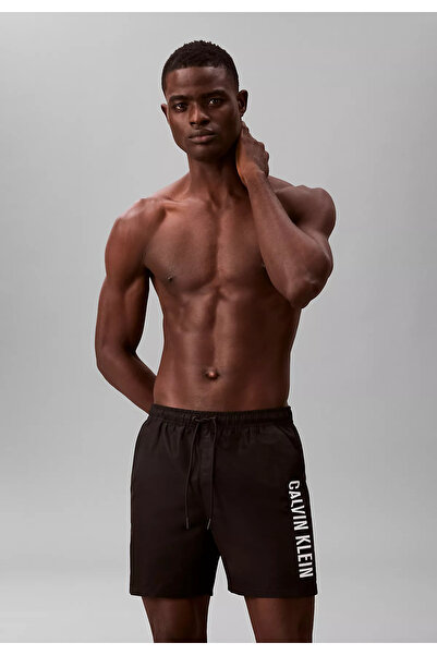 Calvin Klein Men's Logo Printed Quick Dry Fabric Elastic Waist Black Swim Sho...