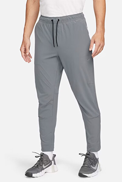 Nike Unlimited Erkek Dri-FIT Fermuarlı Paça Çok Amaçlı Pantolon