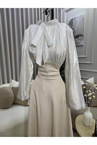FASHION فستان أنيق باللون ، يتميز ببلوزة لامعة مع فيونكة عنق وتفاصيل لؤلؤية ع...