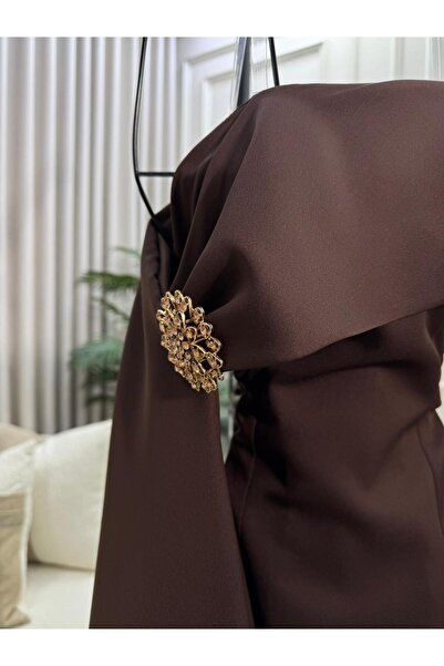 FASHION A long chocolate brown evening dress, featuring a Drapey With Scarf a...