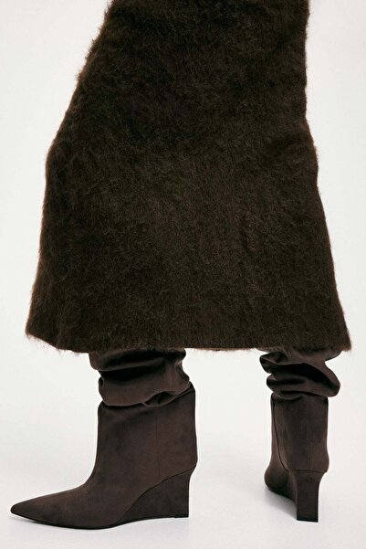 H&M أحذية بكعب إسفين تصل إلى فوق الركبة