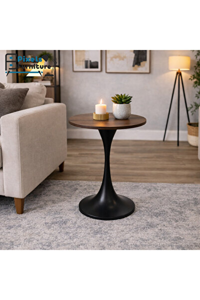 PixelsFurniture A round serving table from Pixel Furniture, with a wooden top...