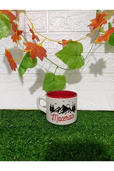 Home Coffee Cup with the Phrase "Adventurer" Written on It.