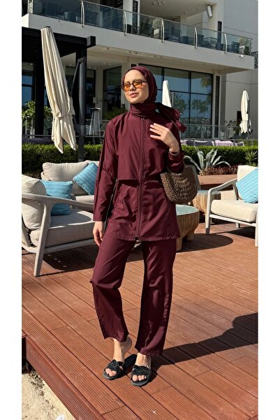 lurex moda بدلة سباحة تيسيتير كاملة التغطية من قماش الباراشوت من الدوحة، مكون...