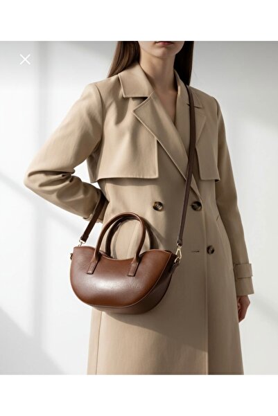 Butik Leather Oval Asymmetric Cut Bag