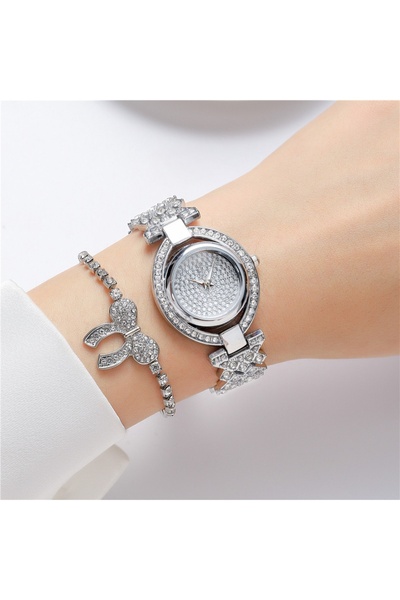 GENERAL A women's watch with a stainless steel strap, featuring an elegant de...