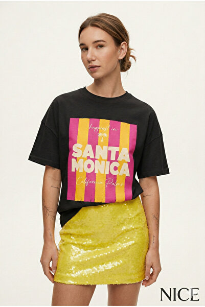 NİCE Жіноча футболка Oversize Santa Monica з принтом, чорна – кругла горловин...